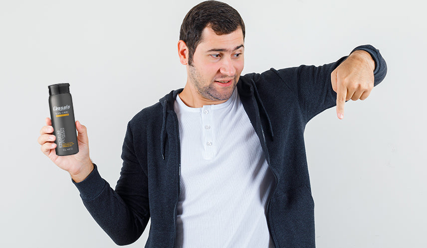 Man Deciding How to Apply Ball Powder