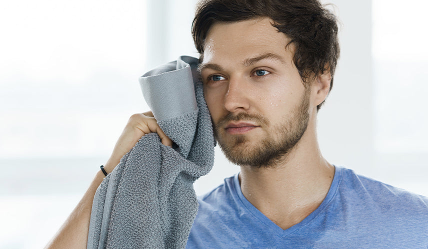 Man Drying Off After a Shower