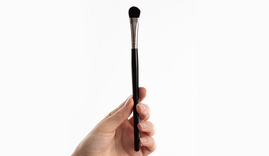 Person Holding a Brush